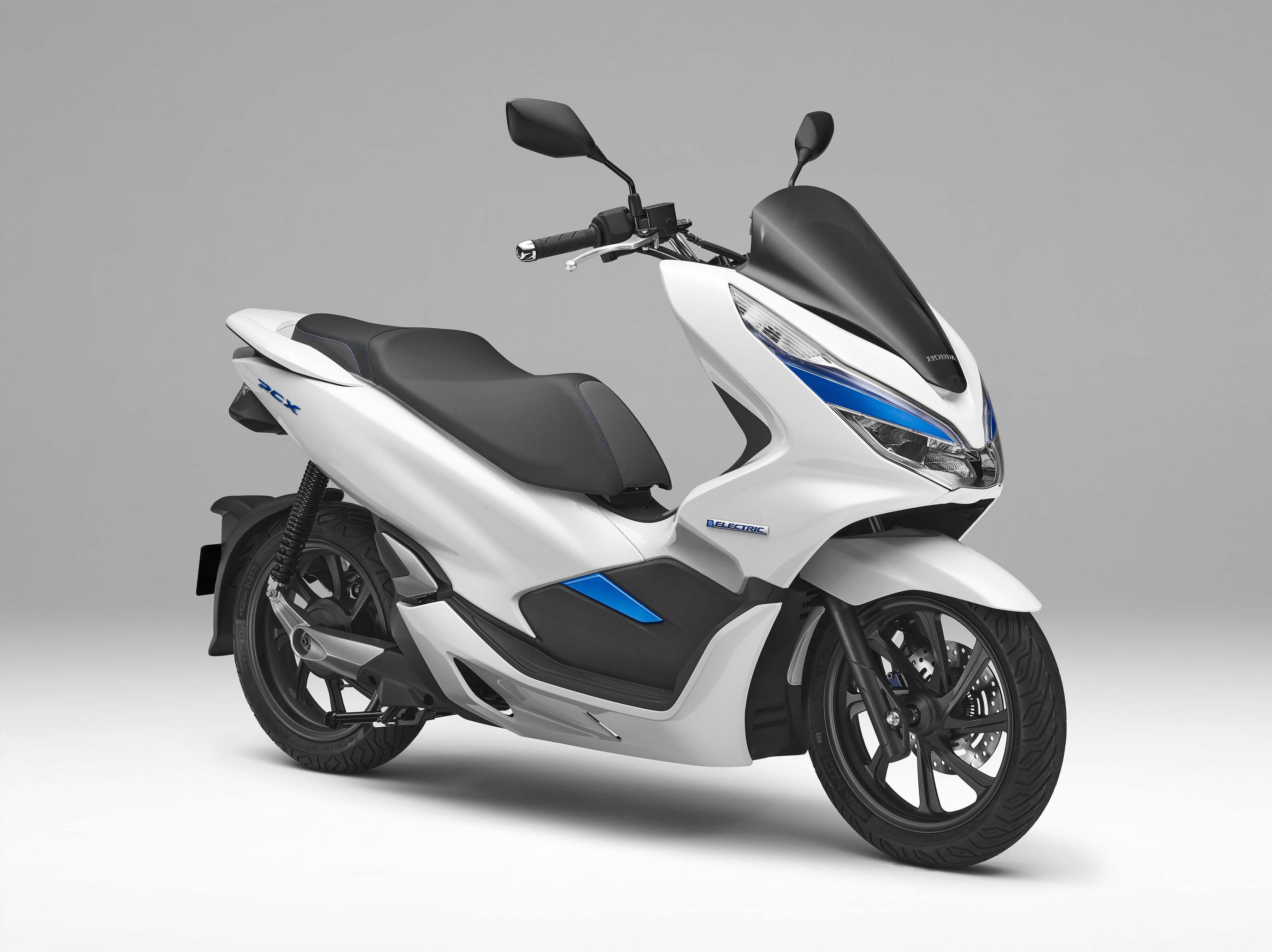  Honda  Debuts Hybrid and Electric Scooters  for 2022 